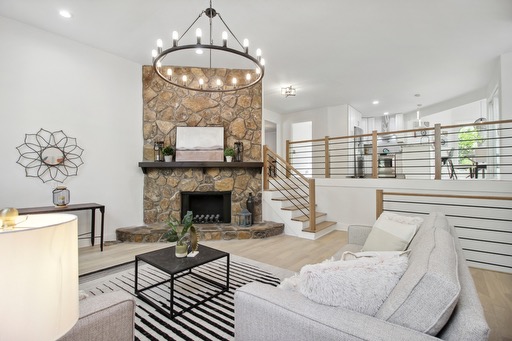 Pitch Lake, Roswell — a stone hearth rising past the stair